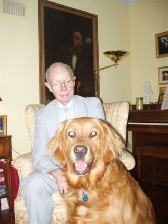 My father, H. E. Riordan, and his favorite dog.